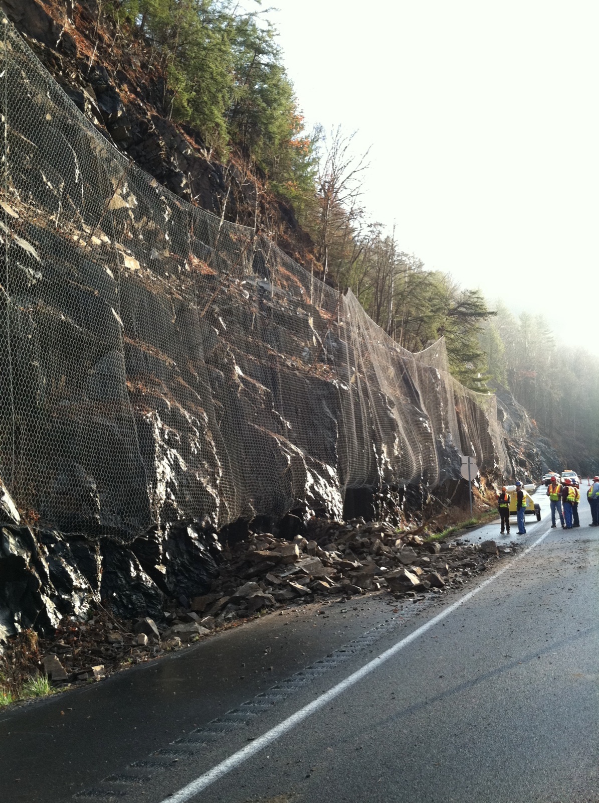 Photograph showing an example of slope modification by human activity that contributed to a landslide or debris flow in western North Carolina